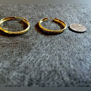 Large hoop yellow gold earrings